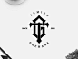 TG monogram logo