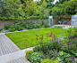 Detail of the herbaceous border in summer showing some Agastache, Nepeta, Erigeron, Penstemon and other flowers in this Islington Garden.