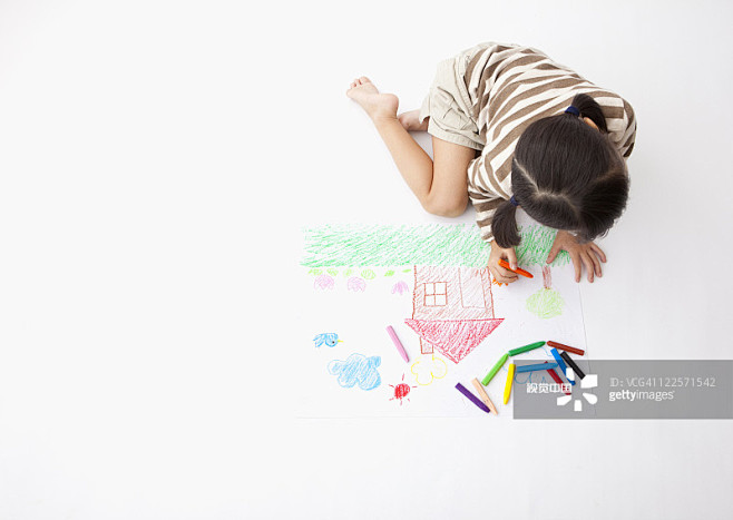 a girl drawing a picture