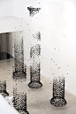 Suspended-Charcoal-Columns-Seon-Ghi Bahk Columns of suspended falling Autumn leaves.