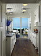 wow, I have no words...living by the water, kitchen open to that gorgeous view...my dream!