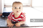 12 Month Old Beautiful Baby Boy Learns to Crawl at Home in the Sunlight创意图片素材 - Moment