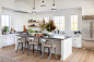 Kitchen - large farmhouse l-shaped light wood floor, beige floor and vaulted ceiling kitchen idea in Richmond with flat-panel cabinets, a farmhouse sink, white cabinets, marble countertops, white backsplash, wood backsplash, stainless steel appliances, an