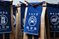 NOSIGNER - Anything : NOSIGNER designed the package of "Anything," the brand of traditional-Japanese-style aprons. The paper bag, originally used for rice, illustrated with the apron provides an actual image of how to wear it and its lineup.