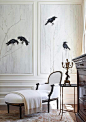 Add Art. Black and white stone-etched panels depict a smattering of ravens. Interior Designer: Gail Plechaty.