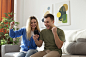 medium-shot-happy-people-with-smartphone