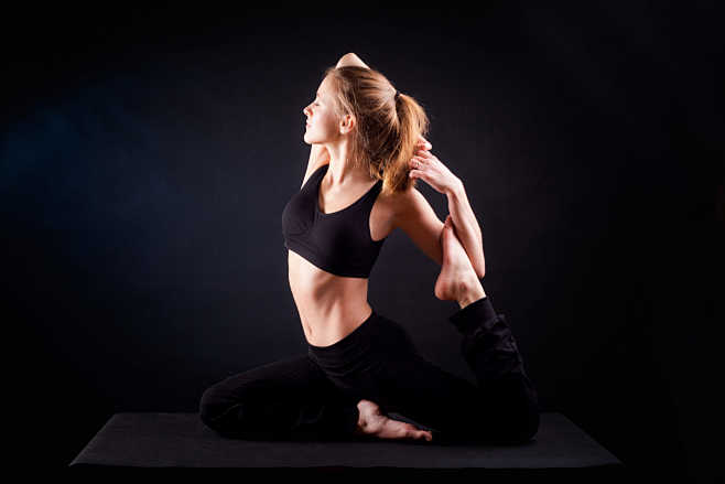 Yoga pose in studio ...