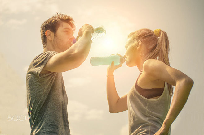 Couple drink water a...