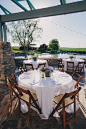 Simple, lovely outdoor reception tables | @lindsgomes | Brides.com