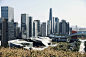 a view of a city with tall buildings
