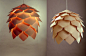 【Pavel Eekra：Crimean Pinecone Lamp松果灯】
俄罗斯设计师Pavel Eekra设计的Crimean Pinecone Lamp，由56块枫木片和螺丝组成，中间没有骨架。灯光从层层叠叠的木片缝隙中洒出来，安逸温暖。