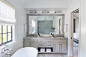 Example of a transitional master light wood floor and beige floor bathroom design in New York with recessed-panel cabinets, gray cabinets, white walls, an undermount sink and gray countertops