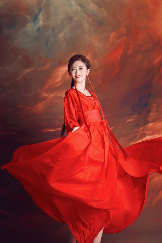 woman in red dress u...