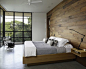 Example of a minimalist concrete floor and gray floor bedroom design in Austin