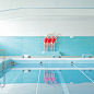 Maria Svarbova\泳池系列\SWIMMING trinity
“游泳池”系列照片始于2014年，是Maria设计的最大的一组摄影创作系列。她会费尽心思的找到有趣的地方，各种公共游泳池、大操场等，玩转现场各种形状、光影及色块组合，迸发灵感进行创意拍摄。
作品中，还表达了她对社会人物关系、环境污染、水源枯竭等各种问题的反思与探讨，提升作品的深度与可读性。