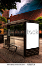 A high dynamic range image of a bus stop with a blank bilboard for your advertising - stock photo