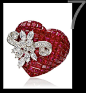 HARRY WINSTON
Inspired by American sailor tattoos from the 1920s to 1950s, Harry Winston has created a limited collection of one-off brooches featuring hearts, flowers and daggers. This Tattoo collection heart-shaped ruby brooch with diamond blossoms has 