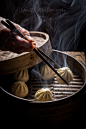 Manti dumplings in bamboo steamer