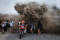 Bikers and spectators gathered to watch the Qiantang tidal bore run on Aug. 13 as a wave crashes inland on the banks of the Qiantang River in Hangzhou in east China's Zhejiang province. Known as one of the world's largest tidal bore, the tide rushing into