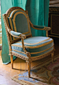 Marie Antoinette's armchair from the Palace of Versailles. It was made by French cabinet maker Georges Jacob (1739-1814). This blue & yellow gold chair was kept in the Queen's private Gold Cabinet room.: 