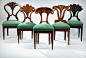 Assembled set of seven Austrian, Biedermeier, Walnut Dining Chairs