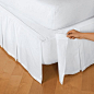 Detachable box pleat bedskirt. Attaches with Velcro®. Add a handsome accent below your bed with a classic box pleat bedskirt.