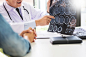 Doctor analysing a scan or x-ray film explain a ct scan talking to patient treatment brain Premium Photo