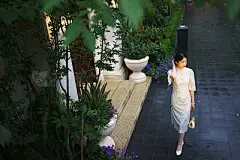 Young woman  standing near door