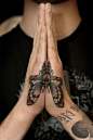 Butterfly tattoo connection on both hands