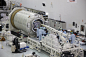 KSC-20160127-PH_JBS0001_0085 : In the high bay inside the Space Station Processing Facility at NASA’s Kennedy Space Center in Florida, technicians prepare a customized insertion tool to assist with loading of equipment and supplies into the Orbital ATK Cy