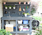 Love to garden? How to make a gorgeous DIY Potting Bench from FREE pallet wood! Has ALL the bells and whistles: a faucet, sink, running water, mounted hose reel, shelves, tool storage, pegboard and more! Free tutorial instructions and supply list included