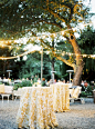 Fun Linens for Cocktail Hour | Al Fresco Lighting | Photography: Gia Canali   Read More: http://stylemepretty.com/2011/03/14/a-garden-wedding-by-gia-canali-a-shared-dress/: 