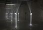 Fresnel lenses make light curve in Arcades installation by Troika : Design studio Troika used Fresnel lenses to create an arcade from beams of light that appear to curve at the Interieur design biennale in Kortrijk, Belgium.