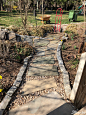 DIY Flagstone Patio - I spruced up the walkway around our farmhouse with flagstone. Although this DIY project was hard work it looks beautiful & I am so happy with how it turned out.  And it was FREE to do! #diyprojects #flagstone #hardscape http://le