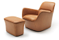 the design of the generous easy chair draw on shapes found in automotive construction