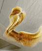 新的扎哈·哈迪德 x SLAMP 照明雕塑在空间中起伏和扭曲