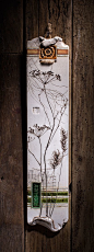 Botanical pieces have been pressed into the wet clay to create the elegant look of those wall plaques.Varied textures and vibrant colors make them an exquisite piece of the home decor.