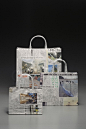 袋子 "日本高知县四万十川，素有日本最后一条清流的美誉。流域附近的商户十分注重环保意识，坚持用报纸而不是塑料袋包装商品。这系列的设计，灵感便是来自四万十川的报纸袋。纸袋的报纸只是折迭（不切割）和黏在一起，制作简单。这是一种传统的手工艺折纸方法，帮助市民避免浪费。四万十川区将这些环保包装袋的介绍给世界，推广回收环保运动。 "Mr. Makoto UMEBARA
