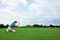 人,运动,户外,30岁到34岁,休闲追求_150415637_A woman golfing on a summer day._创意图片_Getty Images China