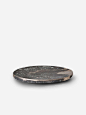 Segment 46 Plate in Casted Bronze by Michael Verheyden : Belgian Designer Michael Verheyden creates uncommon objects for common rituals working with durable materials that feel natural and age beautifully — wood, leather, and stone — to produce timelessly