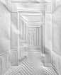 通过压印、折皱等平凡的手法，德国艺术家Simon Schubert在简单而普通的白色纸张上，创建了许多如浮雕一般的楼梯、走廊等建筑空间场景。作品上的折痕往往只有几毫米 ，因此在创作完成后，艺术家还会巧妙利用不同角度的光线，来创建出纸上建筑空间的三维立体感。
