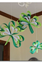 LOVE these shamrocks made out of paper - there's a tutorial on how to make them - so easy!! - -Paper Strip Shamrocks ~ Sugar Bee Crafts