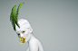 White Garden : White Garden is a project which mixes the iconic hats, flower compositions and minimalistic looks. The model's skin was painted in white and with the light background it makes more accent on the colors. All the paper hats are handmade by im