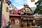 其中包括图片：Rapunzel's Tower & Village at Magic Kingdom