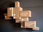 another take on different size boxes stacked together - I like that they are attached to the wall and not sitting on the ground: