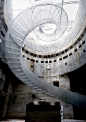 Winding central staircase leading into the tirpitz bunker. Blåvand Bunker Museum’ by BIG Architects