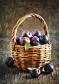 Fresh plums in basket by Anjelika Gretskaia on 500px