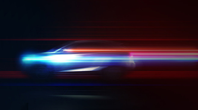 科技感未来汽车快速感驾驶与彩色灯光轨迹