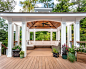 Entertainment Deck with Pavilion : This award-winning design resolves the issue of a wet backyard by including all the entertaining needs in the deck ... As you exit the kitchen, you walk into a seating area with fire pit which is
