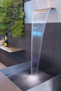 A modern water feature for your residential landscape that mesmerized you.